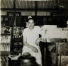 Nathan Schoenbrun in his candy store 1949