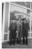 Sam, Arnold, and Leon Schonbrun in front of Sam’s stove shop, Toledo